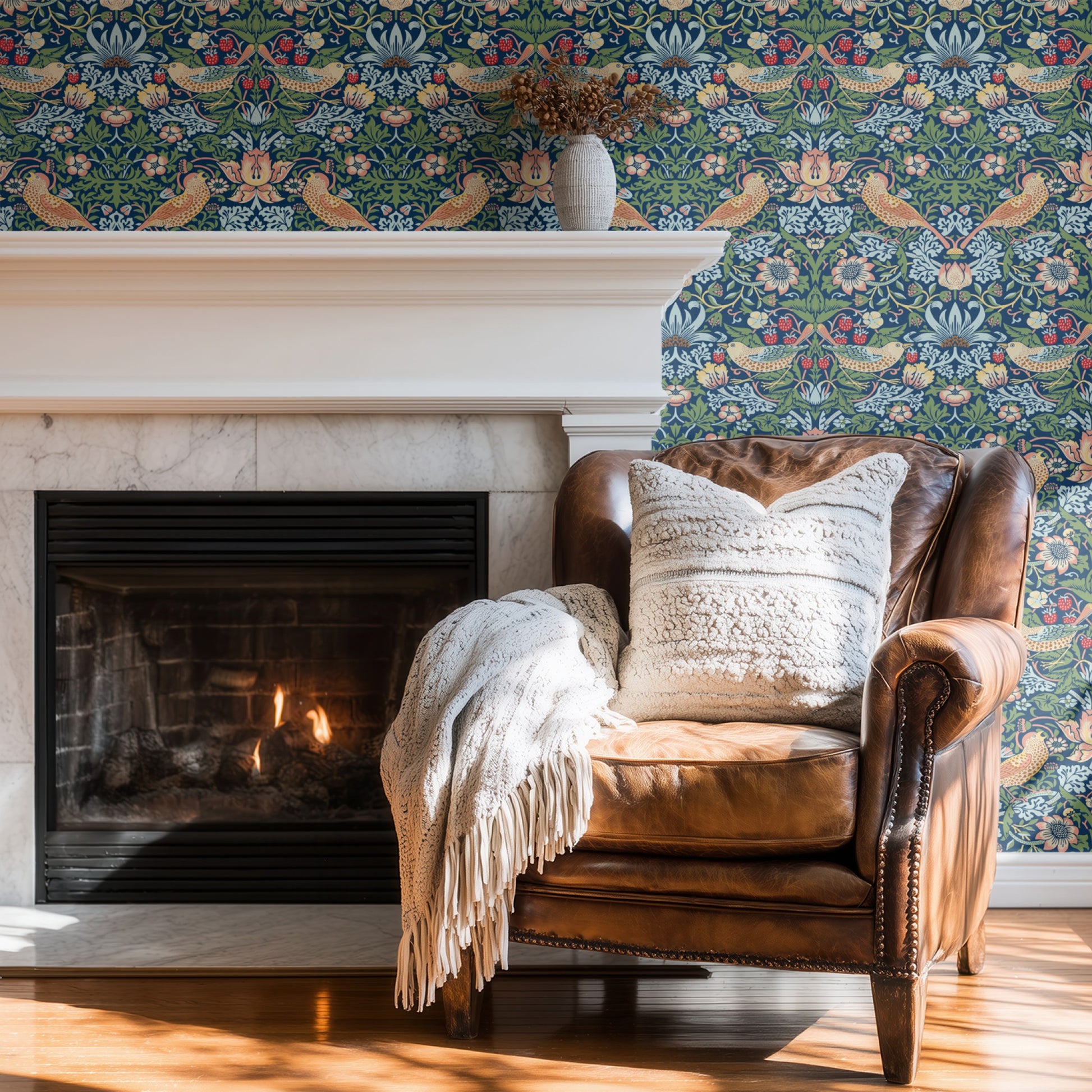 Blue Bird Pattern Wallpaper shown in a second room with the indigo Strawberry Thief reading as iconic Morris decoration in a calmer palette