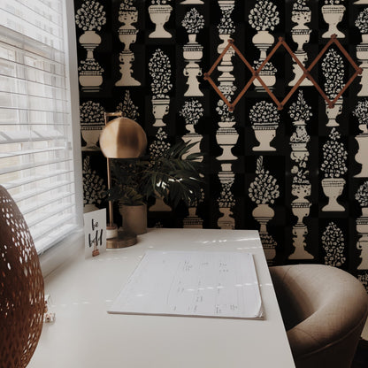 Topiary Urns large scale wallpaper in a styled room