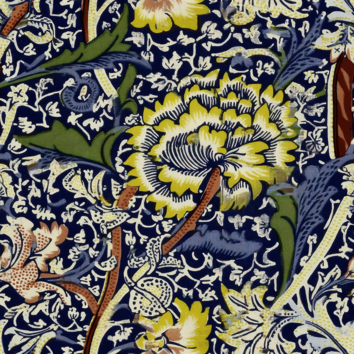 Large yellow and white flowers and twisting stems over a dense navy and cream ground, a William Morris design.