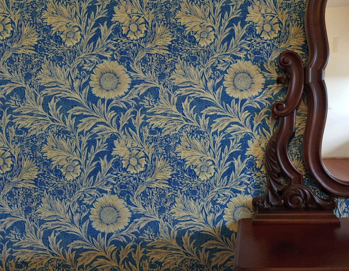 William Morris Marigold Blue large scale wallpaper in a styled room