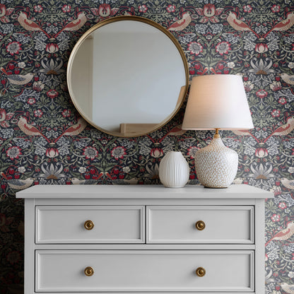 William Morris Strawberry Thief Charcoal & Cranberry wallpaper in a styled room