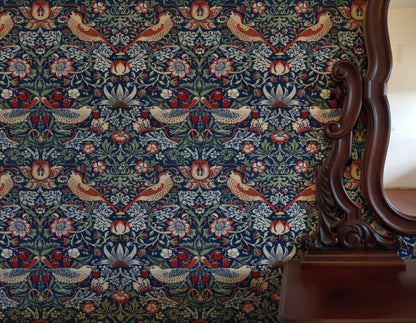William Morris Strawberry Thief Indigo & Madder wallpaper in a styled room