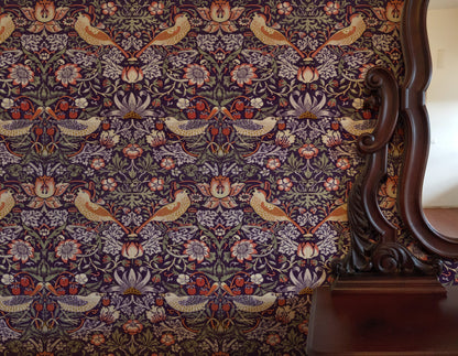 William Morris Strawberry Thief Plum & Ochre wallpaper in a styled room