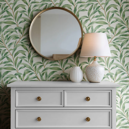 Green Botanical Wallpaper installed on a room wall with the 1887 Morris willow leaves design in heritage green