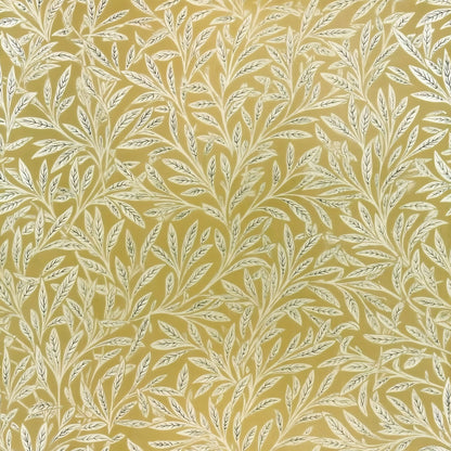 Pale willow leaves on fine stems make a soft all-over pattern on a gold ground, a William Morris design.